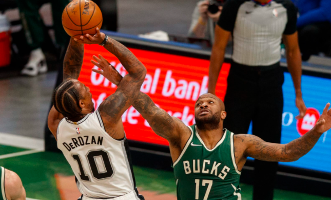  霍勒迪防守建功雄鹿遏制篮网攻势取得胜利  